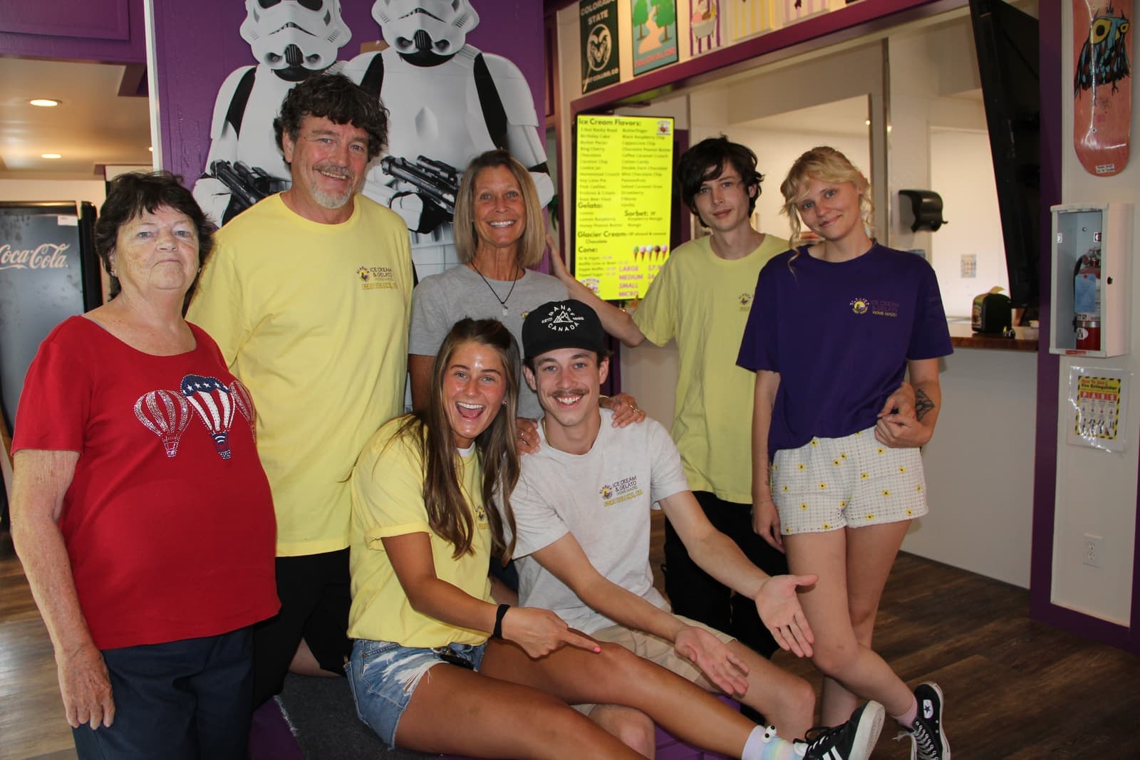 The whole family gathered inside the parlor with the Stormtrooper standee